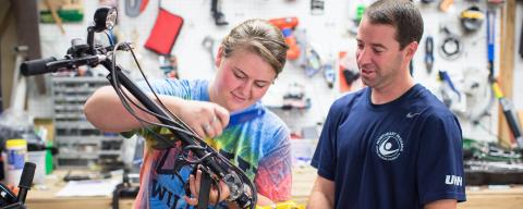 Staff maintaining equipment