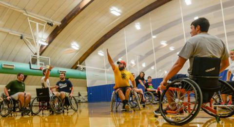 people playing wheelchair frisbee