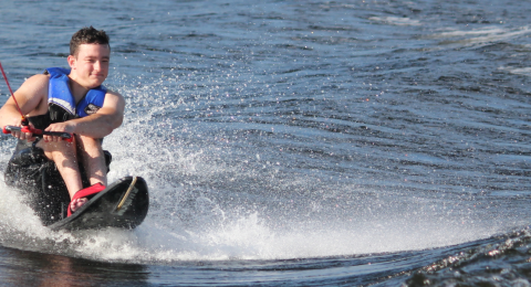 man waterskiing