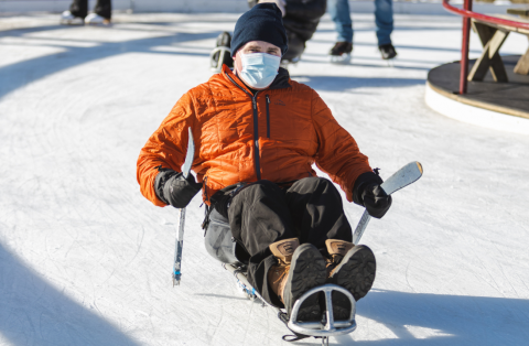skating in a seated sled