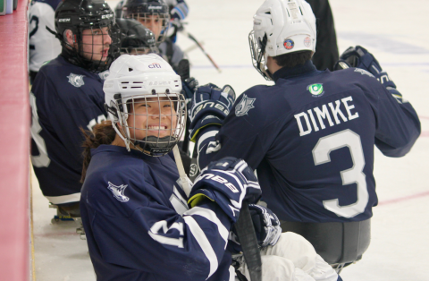 sled hockey player smiling