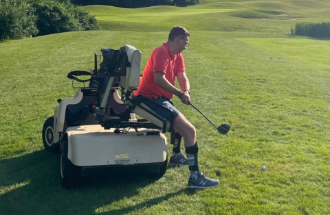 man golfing